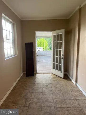 an empty room with windows