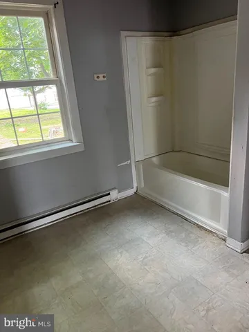 a view of a small space with a window