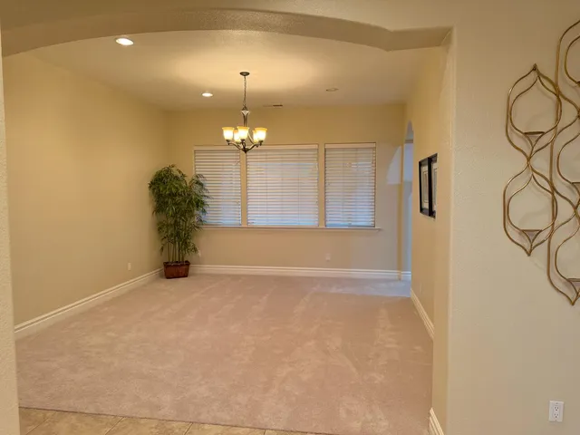 a view of a room with a chandelier