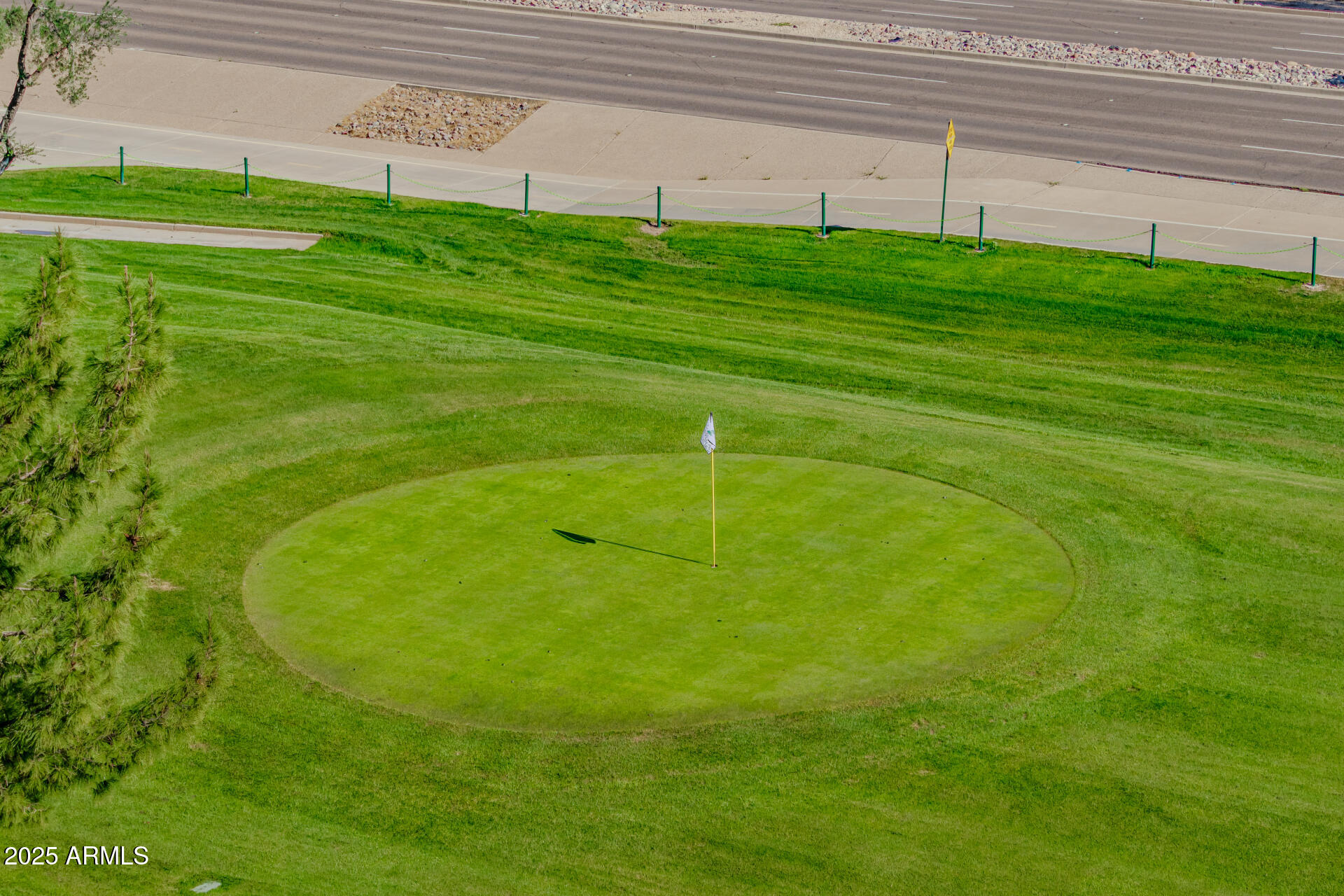 7970 East Camelback Road, Unit 507 Scottsdale, AZ 85251 - Photo 26 of 33 a view of a field with grass