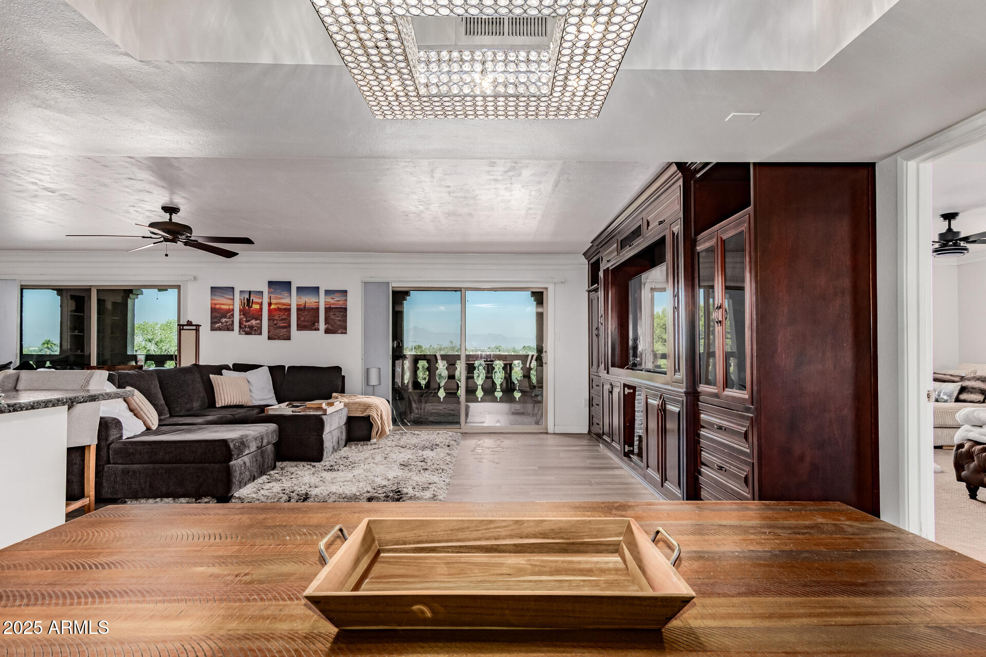 7970 East Camelback Road, Unit 507 Scottsdale, AZ 85251 - Photo 29 of 33 a view of a livingroom with furniture wooden floor and windows