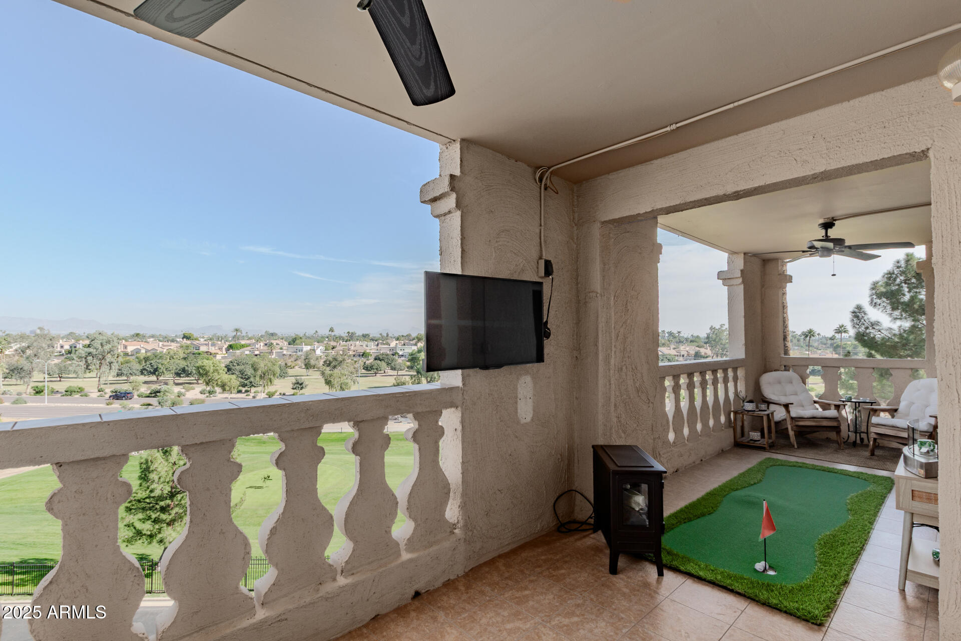 7970 East Camelback Road, Unit 507 Scottsdale, AZ 85251 - Photo 30 of 33 a front view of a house with garden