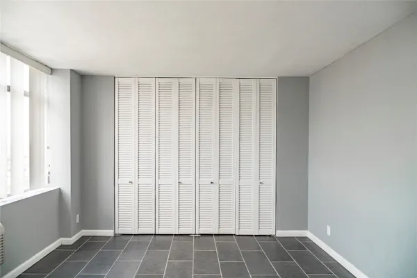 a view of an empty room with window