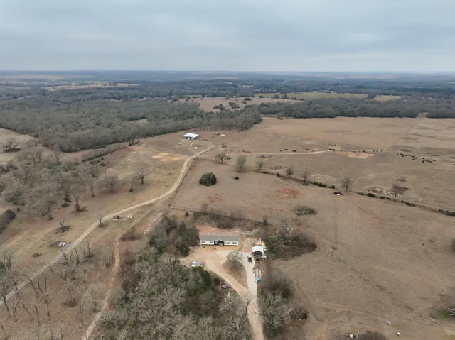 a view of a beach with a city view