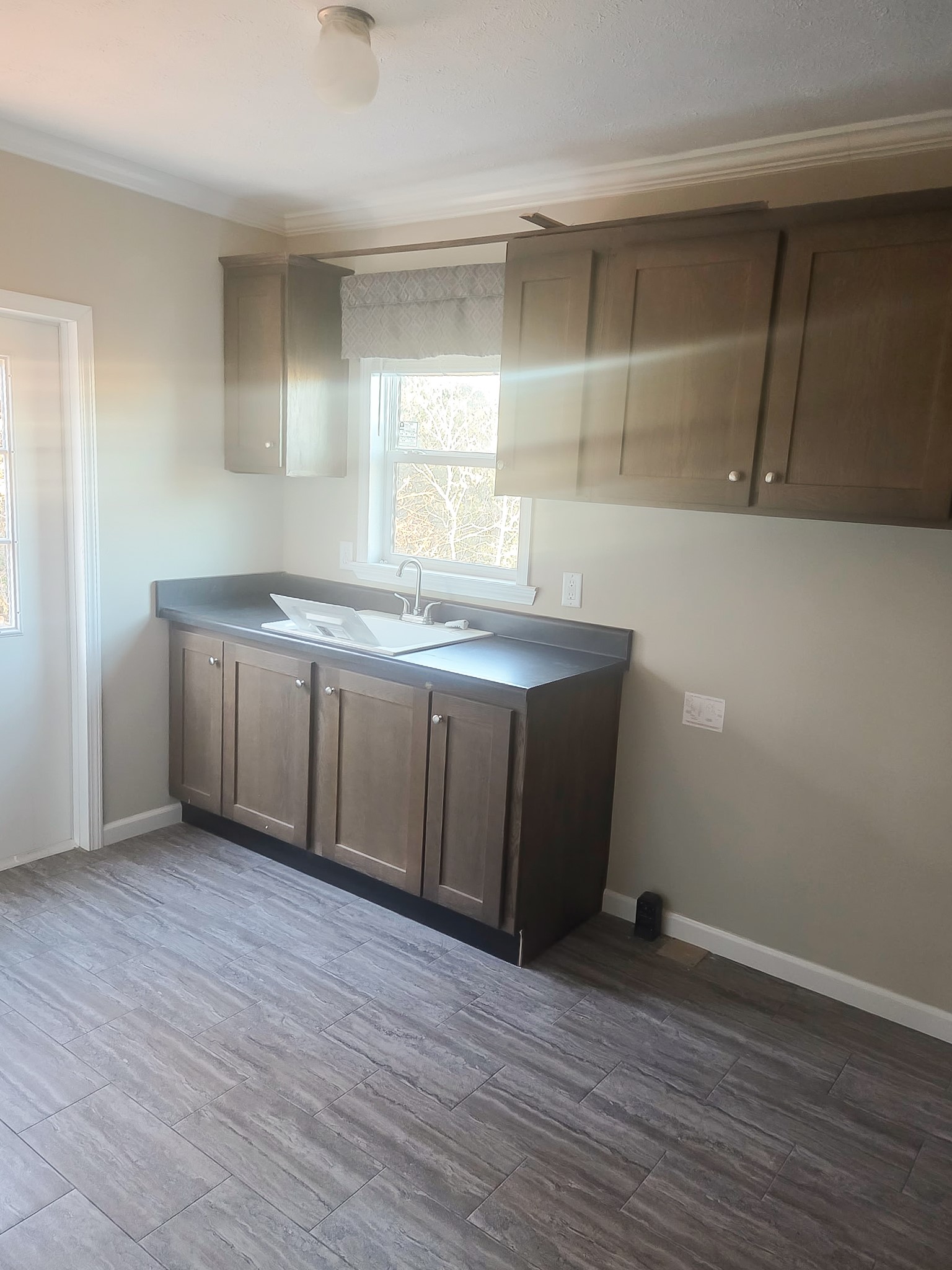 2408 Highway 79 Buffalo, TX 75831 - Photo 14 of 17 a kitchen with wooden floors and cabinets