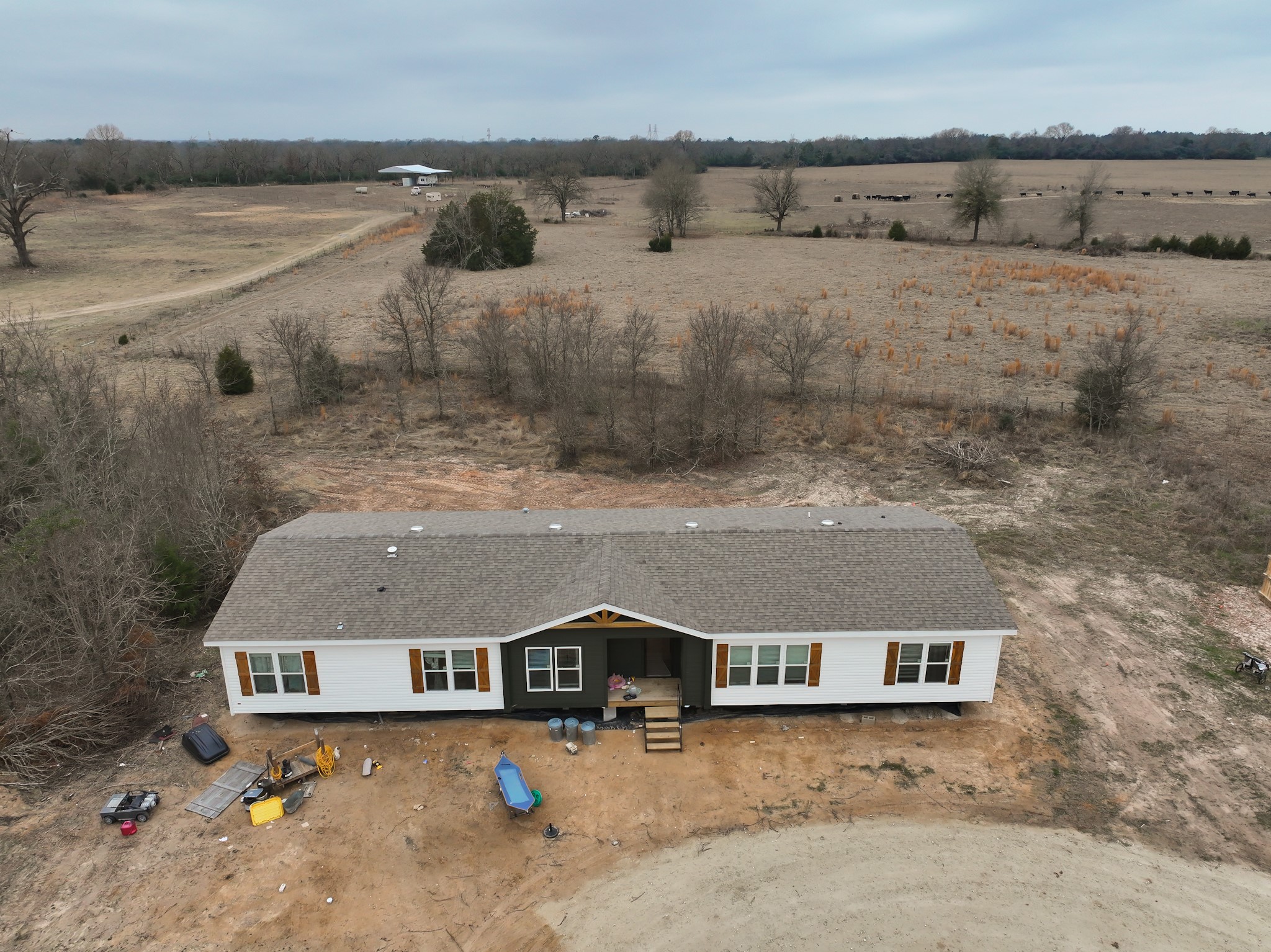 2408 Highway 79 Buffalo, TX 75831 - Photo 2 of 17 an aerial view of a house with a yard and lake view