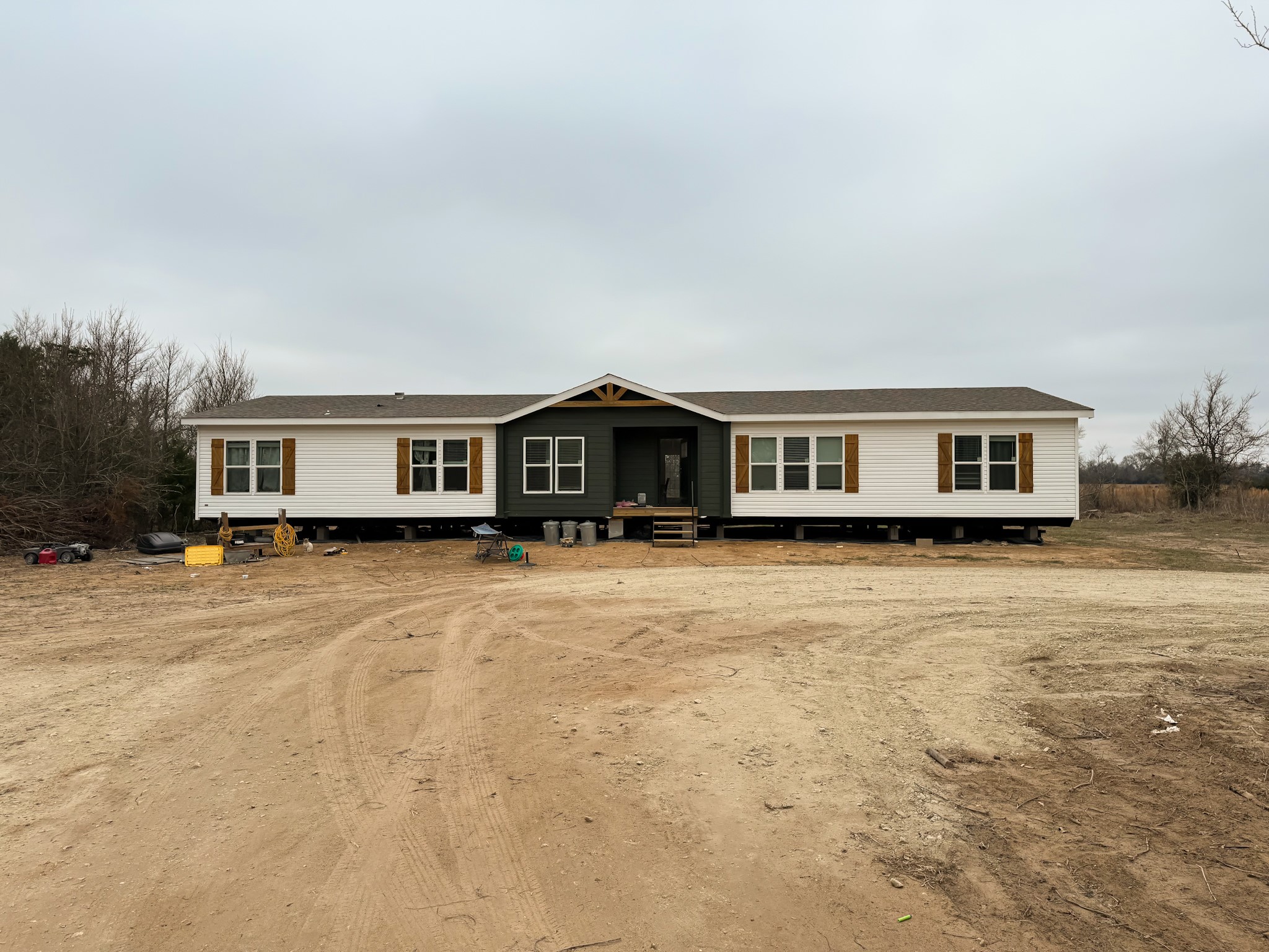 2408 Highway 79 Buffalo, TX 75831 - Photo 6 of 17 a front view of a house with a swimming pool