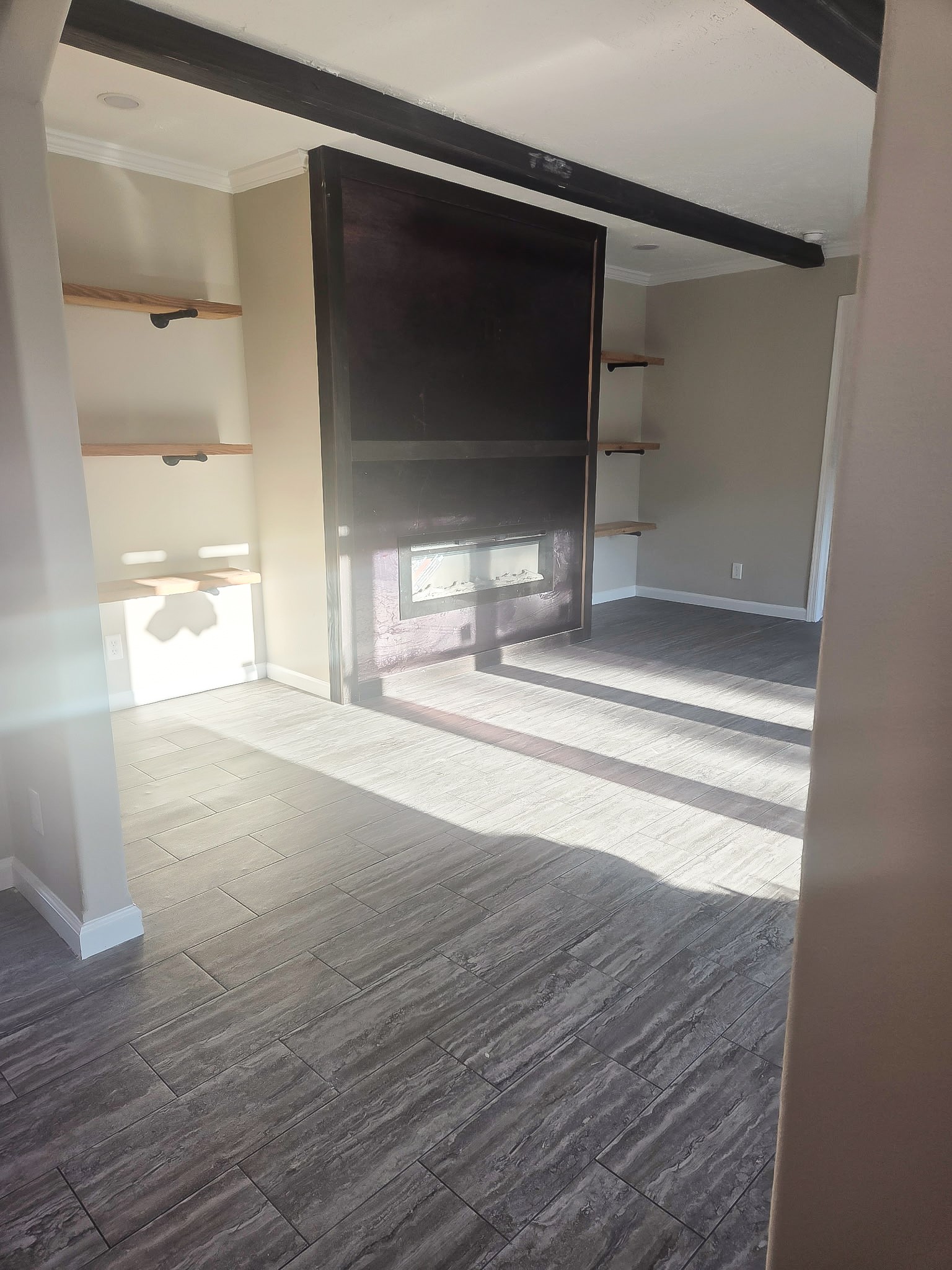 2408 Highway 79 Buffalo, TX 75831 - Photo 9 of 17 a view of empty room with wooden floor and fan
