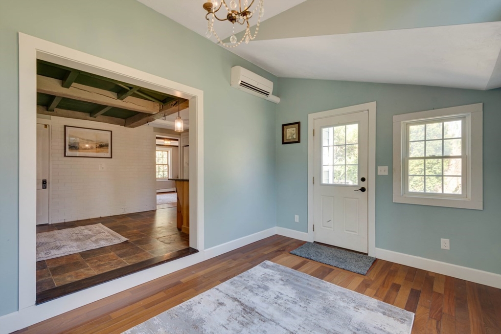 232 Randall Road Berlin, MA 01503 - Photo 18 of 35 wooden floor in an empty room with a window