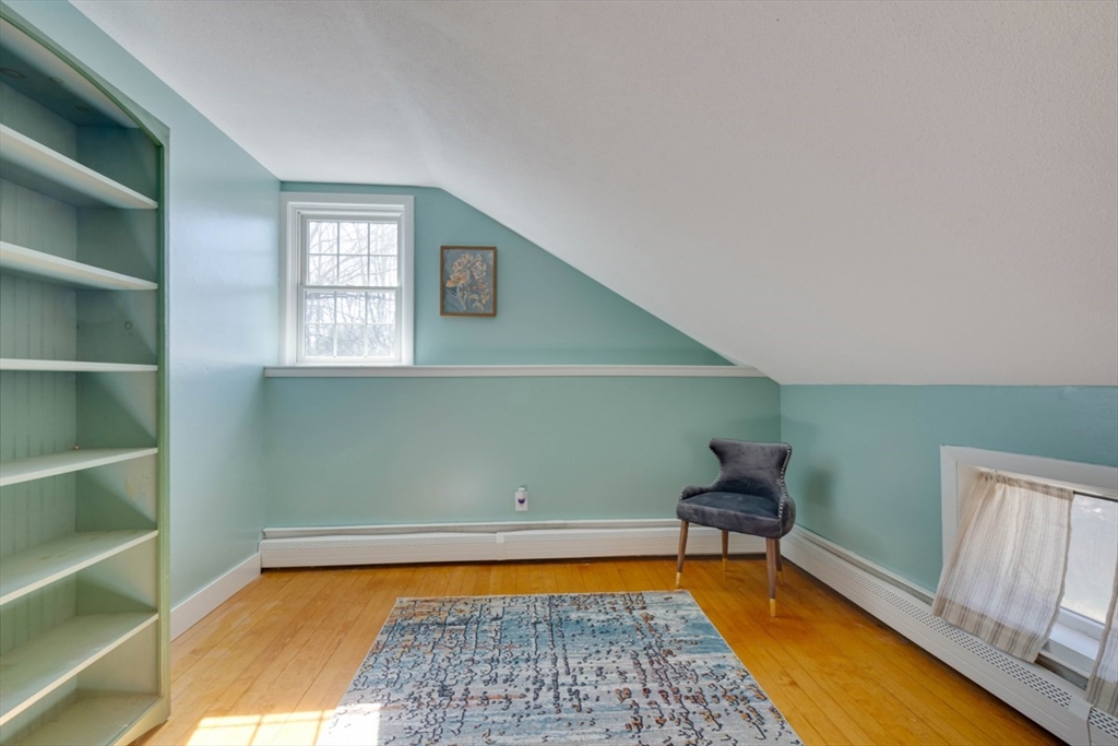 232 Randall Road Berlin, MA 01503 - Photo 26 of 35 a room with furniture and a rug