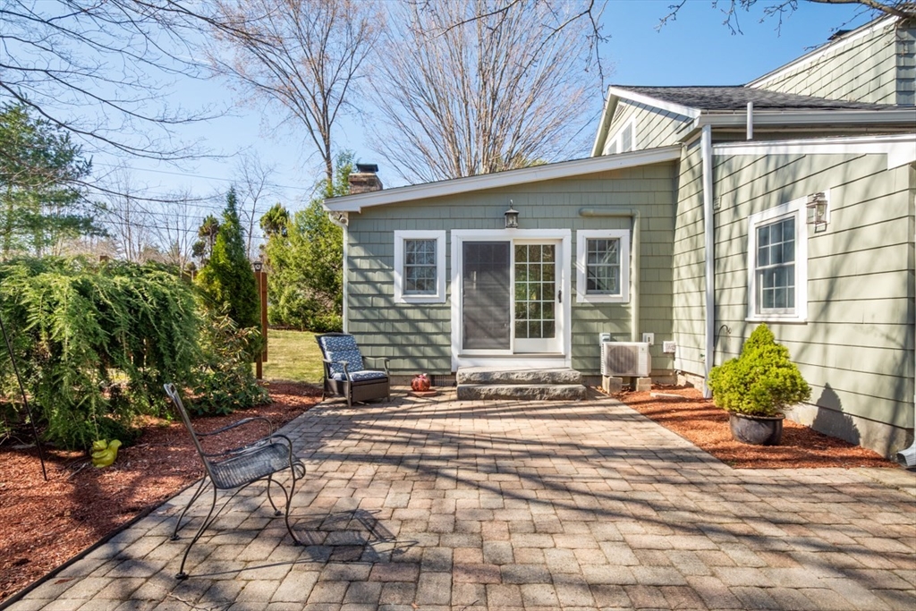 232 Randall Road Berlin, MA 01503 - Photo 32 of 35 a view of a house with a patio