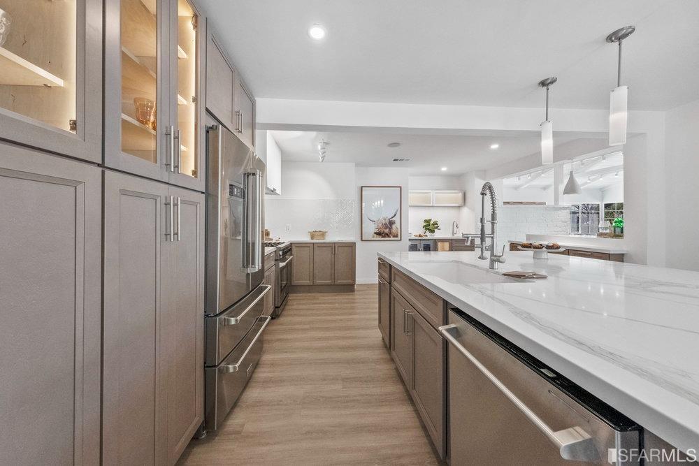 1016 Willow Drive Lafayette, CA 94549 - Photo 12 of 34 a large kitchen with stainless steel appliances lots of counter space and a sink