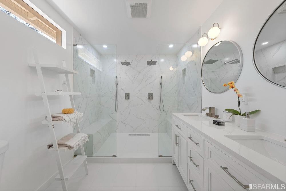 1016 Willow Drive Lafayette, CA 94549 - Photo 23 of 34 a spacious bathroom with a sink a toilet and a mirror