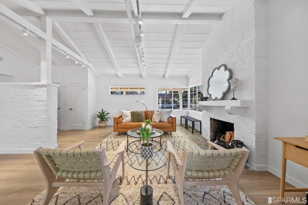 1016 Willow Drive Lafayette, CA 94549 - Photo 3 of 34 a living room with furniture and a fireplace
