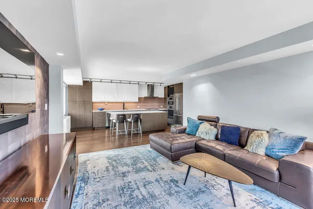 a living room with furniture and a couch