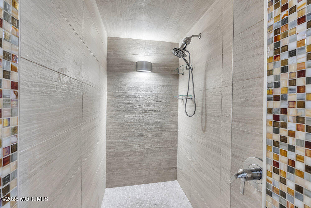 28 Riverside Avenue, Unit 2G Red Bank, NJ 07701 - Photo 18 of 34 a bathroom with a shower