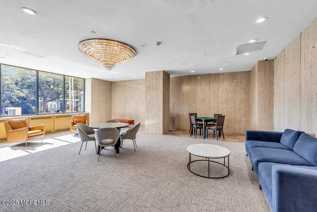 a view of a hallway with wooden shelves