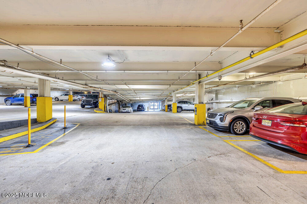 28 Riverside Avenue, Unit 2G Red Bank, NJ 07701 - Photo 24 of 34 a view of parking garage with cars
