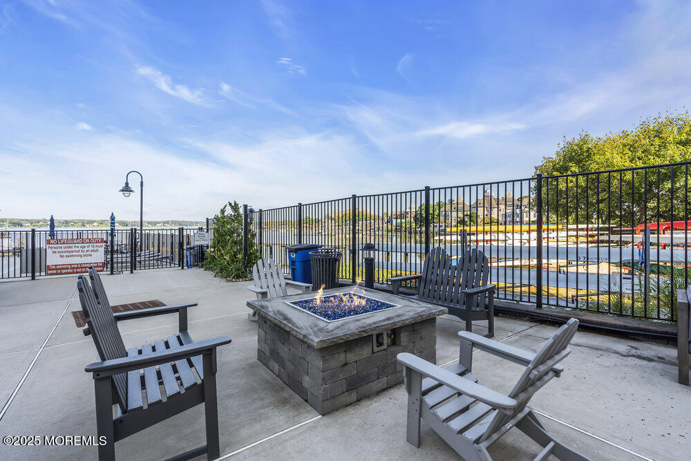 28 Riverside Avenue, Unit 2G Red Bank, NJ 07701 - Photo 27 of 34 a balcony with furniture and iron fence