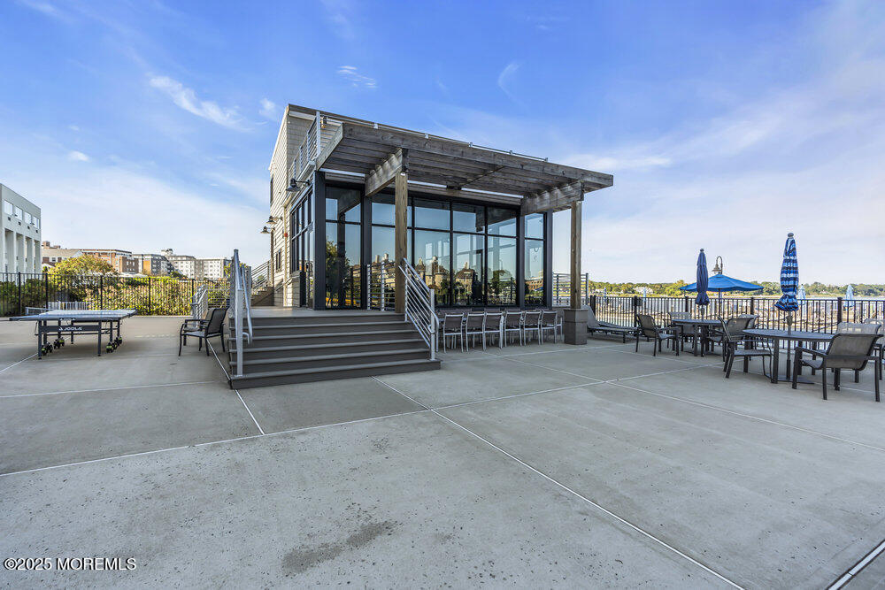 28 Riverside Avenue, Unit 2G Red Bank, NJ 07701 - Photo 28 of 34 a view of outdoor space yard and patio