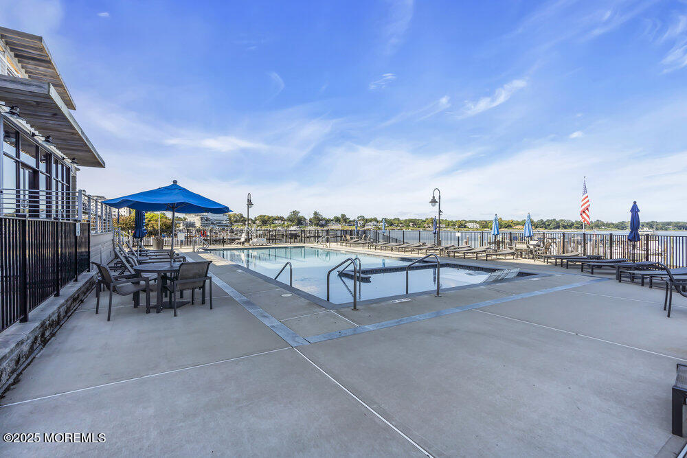 28 Riverside Avenue, Unit 2G Red Bank, NJ 07701 - Photo 29 of 34 a view of a terrace with furniture and a patio
