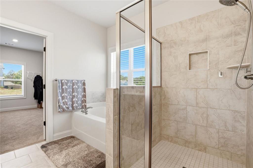 449 Banff Drive Winder, GA 30680 - Photo 21 of 56 a bathroom with a shower
