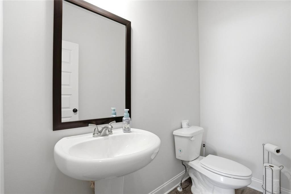 449 Banff Drive Winder, GA 30680 - Photo 33 of 56 a bathroom with a sink and a toilet