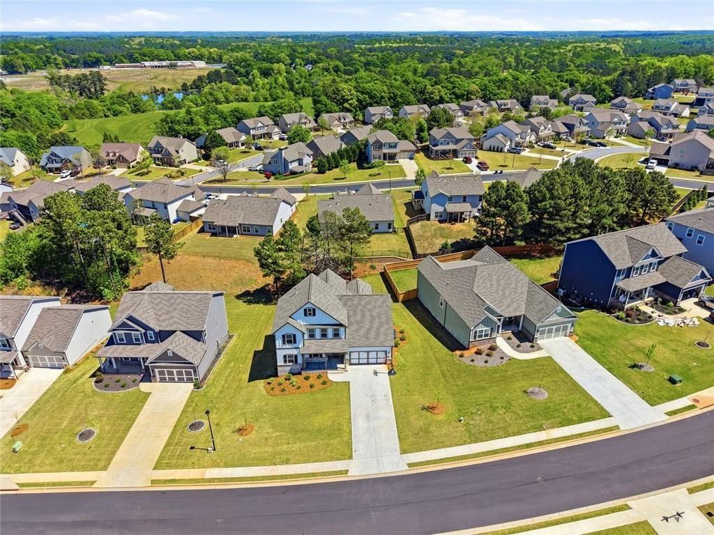 449 Banff Drive Winder, GA 30680 - Photo 41 of 56 an aerial view of residential houses with outdoor space
