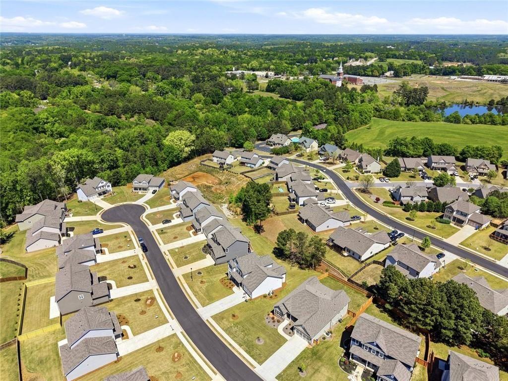 449 Banff Drive Winder, GA 30680 - Photo 43 of 56 an aerial view of residential houses with outdoor space