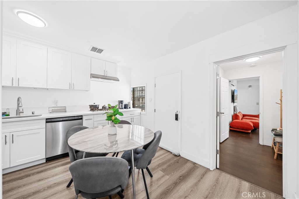 1415 South 2nd Street Alhambra, CA 91801 - Photo 17 of 58 a kitchen with a table and chairs in it
