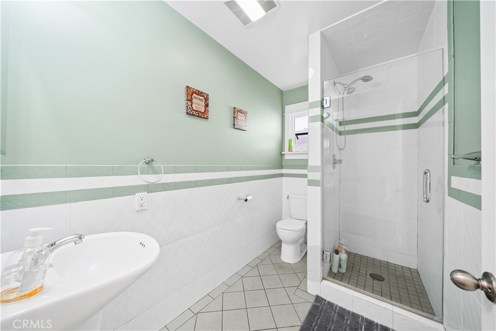 1415 South 2nd Street Alhambra, CA 91801 - Photo 19 of 58 a bathroom with a sink a toilet and shower