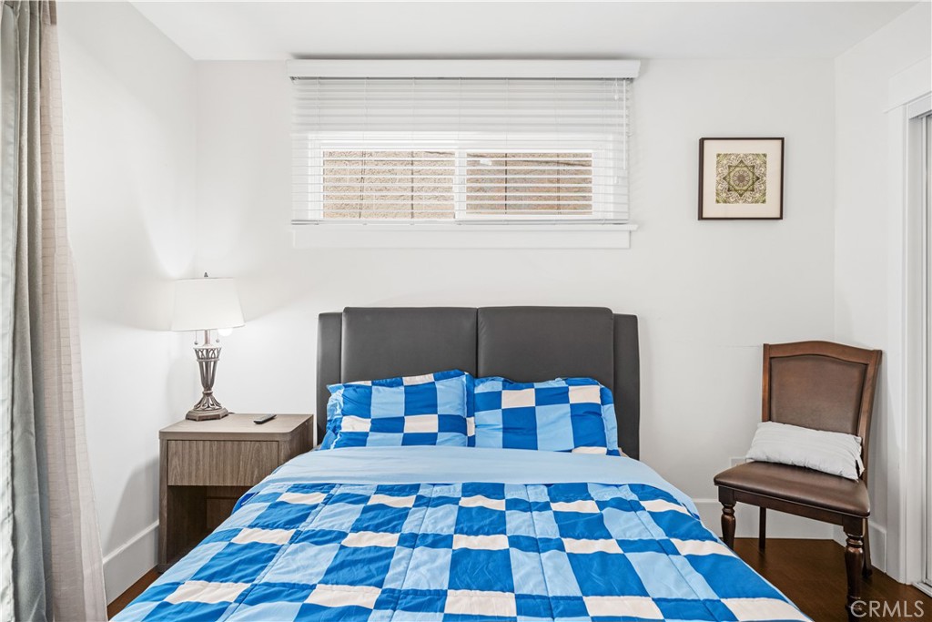 1415 South 2nd Street Alhambra, CA 91801 - Photo 21 of 58 a bedroom with a bed and wooden floor