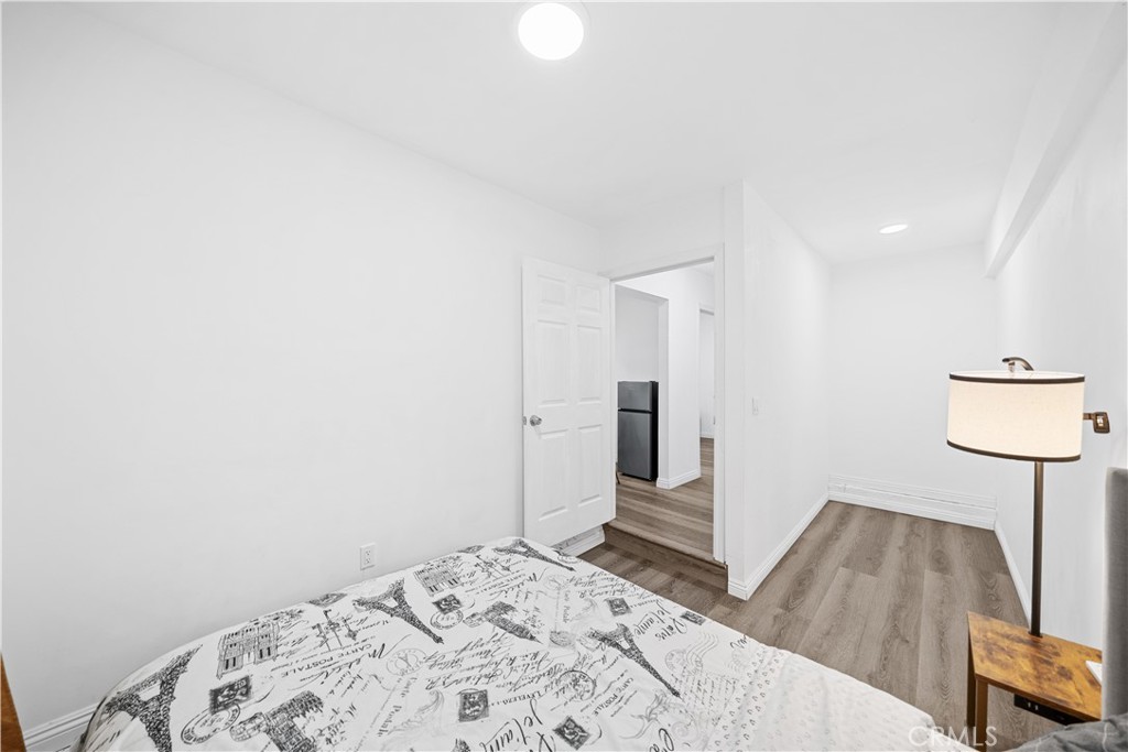 1415 South 2nd Street Alhambra, CA 91801 - Photo 31 of 58 a bedroom with a bed and a chair