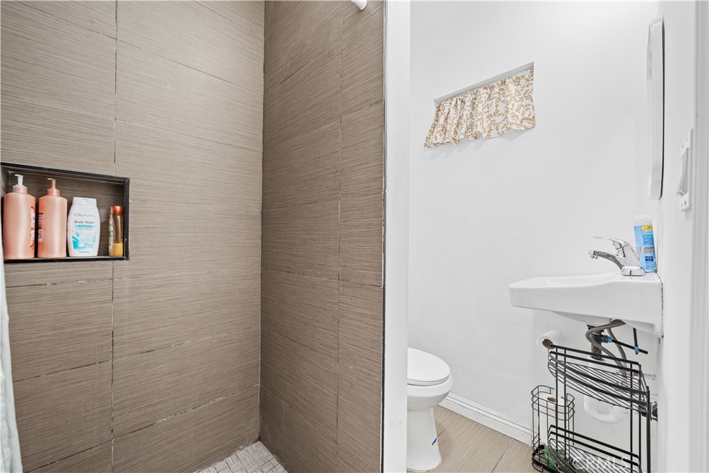 1415 South 2nd Street Alhambra, CA 91801 - Photo 34 of 58 a bathroom with a toilet a sink and view