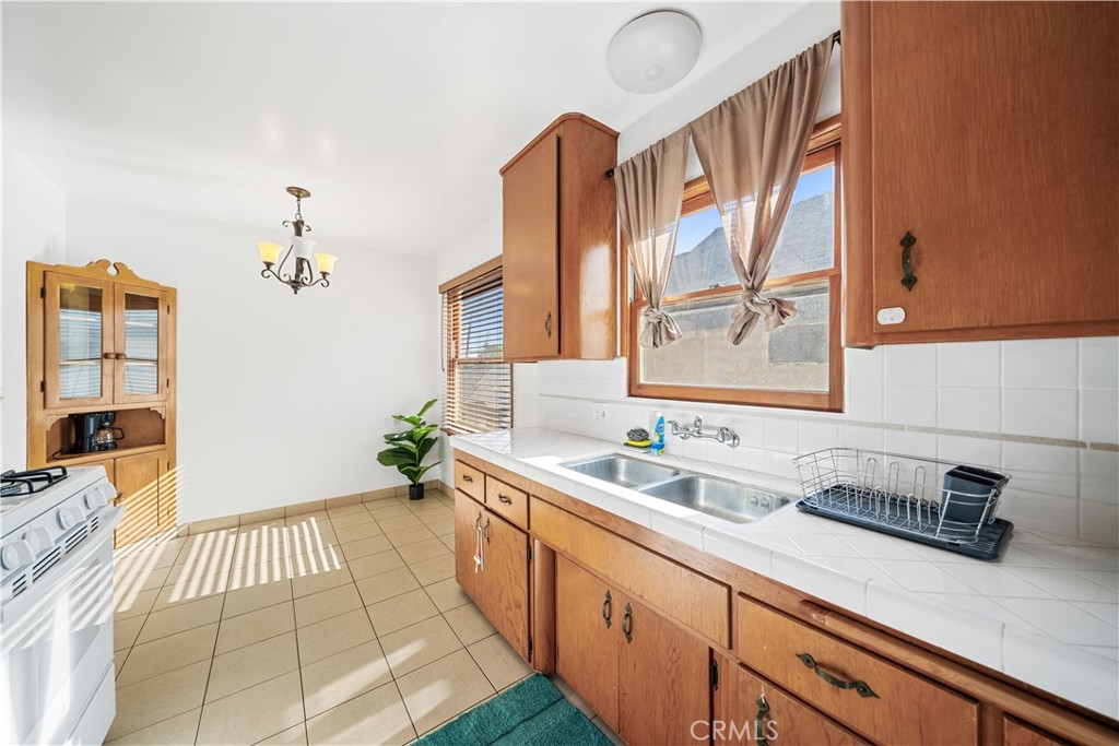1415 South 2nd Street Alhambra, CA 91801 - Photo 42 of 58 a spacious bathroom with a sink and mirror