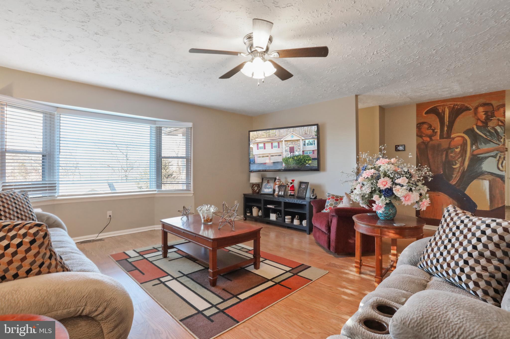 Living room with plenty of Natural lighting