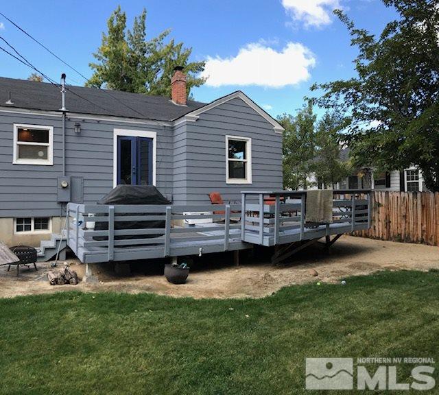 1616 Watt Street Reno, NV 89509 - Photo 3 of 12 a backyard of a house with barbeque oven and outdoor seating