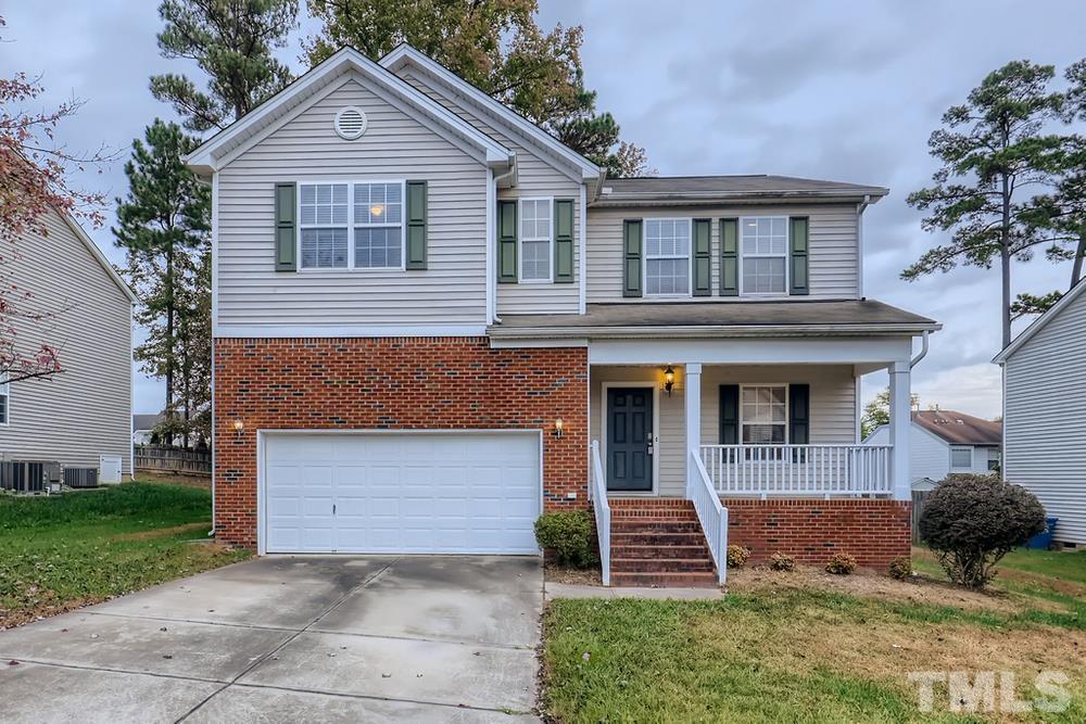 303 Whitney Lane Durham, NC 27713 - Photo 1 of 28 a front view of a house with a yard
