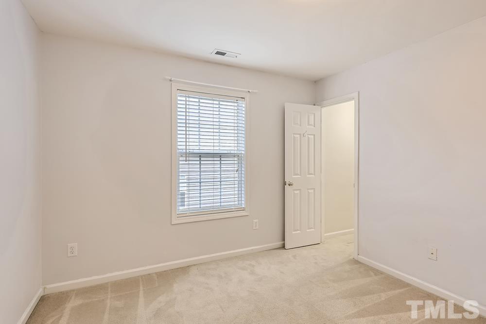 303 Whitney Lane Durham, NC 27713 - Photo 21 of 28 an empty room with windows