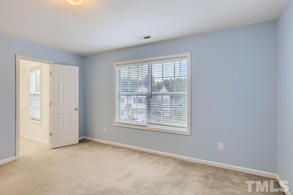 303 Whitney Lane Durham, NC 27713 - Photo 22 of 28 a view of an empty room with a window