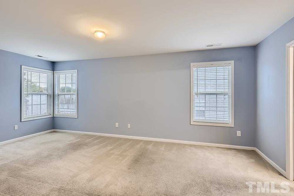 303 Whitney Lane Durham, NC 27713 - Photo 24 of 28 a view of an empty room with a window