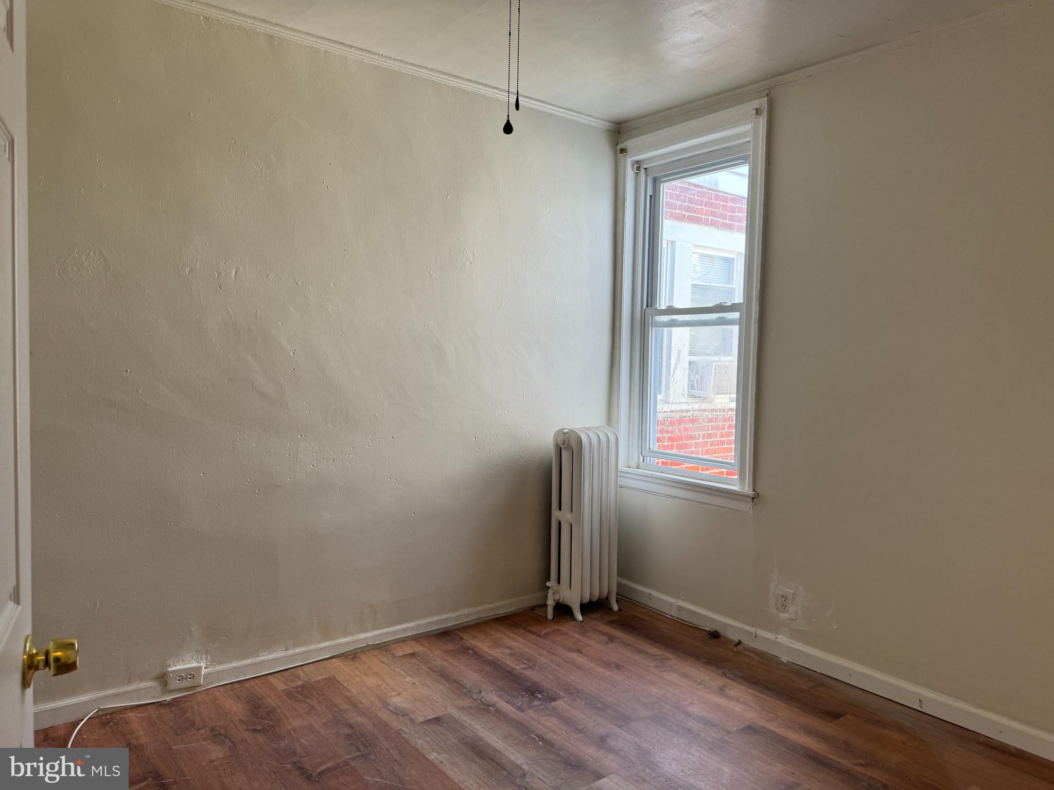 2115 Stenton Avenue Philadelphia, PA 19138 - Photo 10 of 11 an empty room with windows