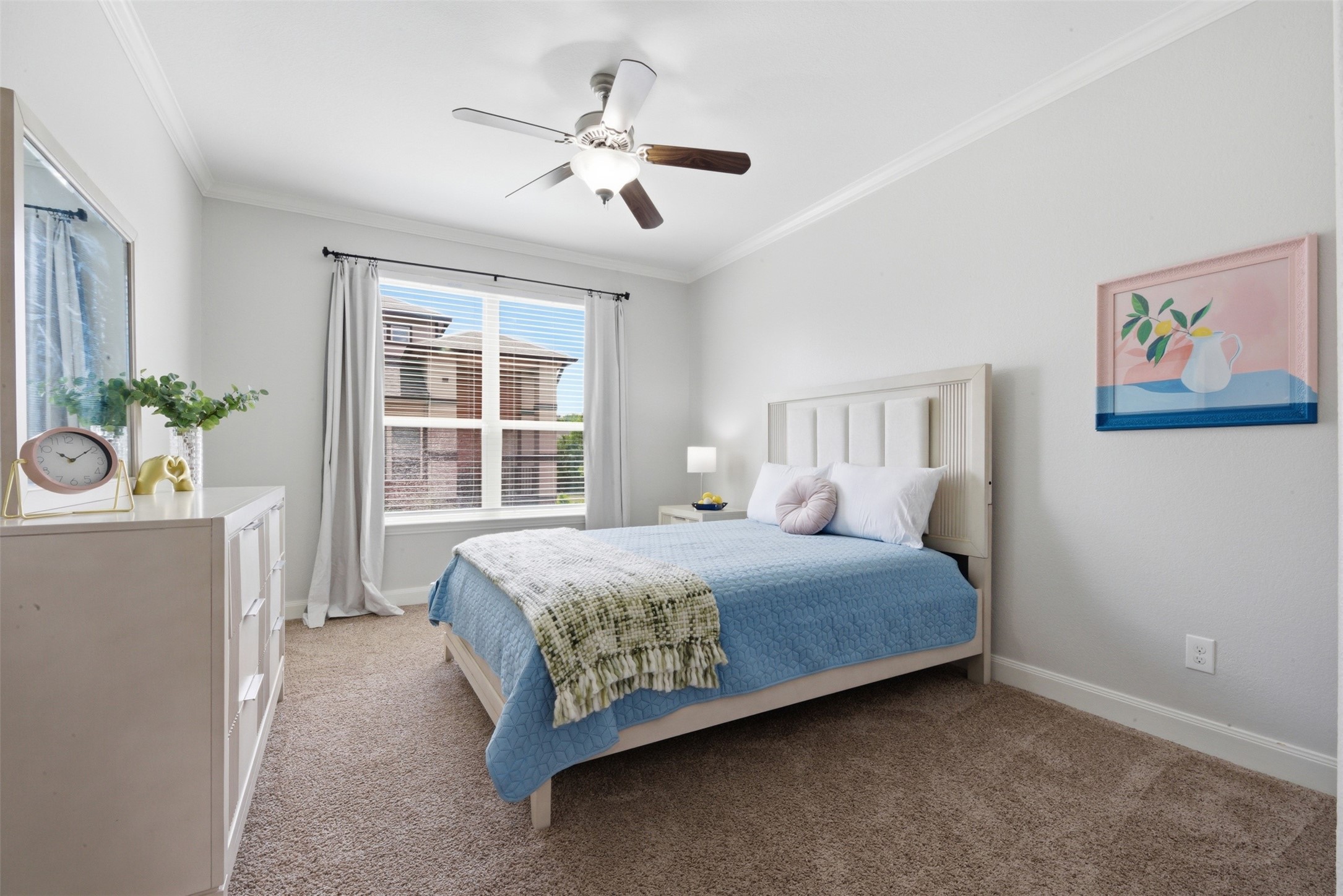 706 Water Street Webster, TX 77598 - Photo 16 of 23 Bright and versatile, this bedroom adapts easily to guests or personal use.