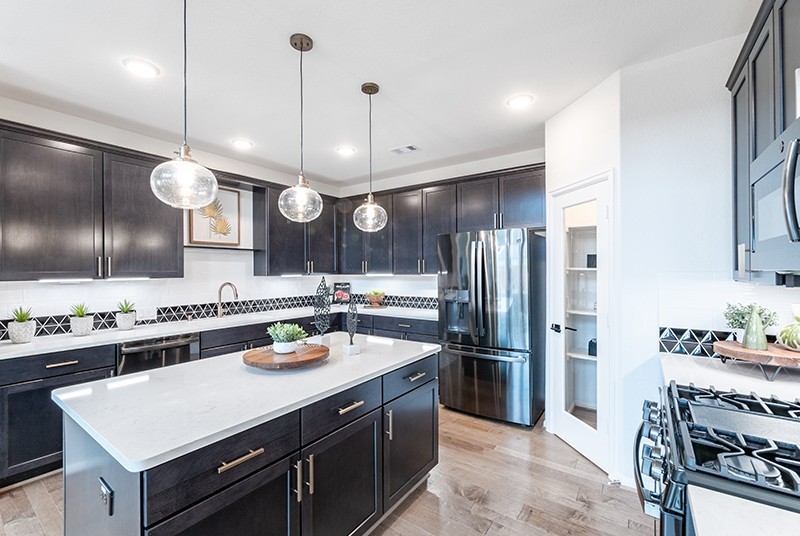 7810 Bear Trace Road Fairview, TN 37062 - Photo 6 of 20 a kitchen with a counter space a sink and stainless steel appliances