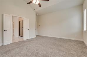 10929 Big Spring Trail McKinney, TX 75071 - Photo 11 of 13 an empty room with chandelier fan