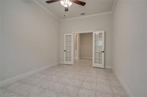 10929 Big Spring Trail McKinney, TX 75071 - Photo 13 of 13 an empty room with chandelier fan