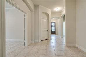 10929 Big Spring Trail McKinney, TX 75071 - Photo 4 of 13 a view of a hallway
