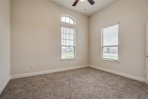 10929 Big Spring Trail McKinney, TX 75071 - Photo 10 of 13 an empty room with windows and closet