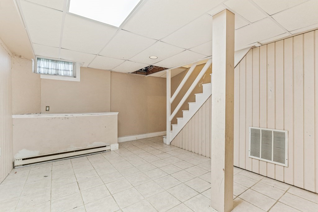 23 Heard Street, Unit 23 Chelsea, MA 02150 - Photo 20 of 27 a view of an entryway with staircase
