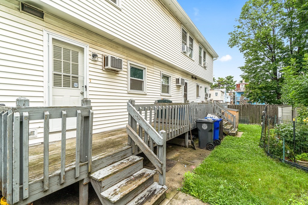 23 Heard Street, Unit 23 Chelsea, MA 02150 - Photo 2 of 27 a balcony with furniture
